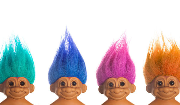 2 troll dolls with blue and pink hair